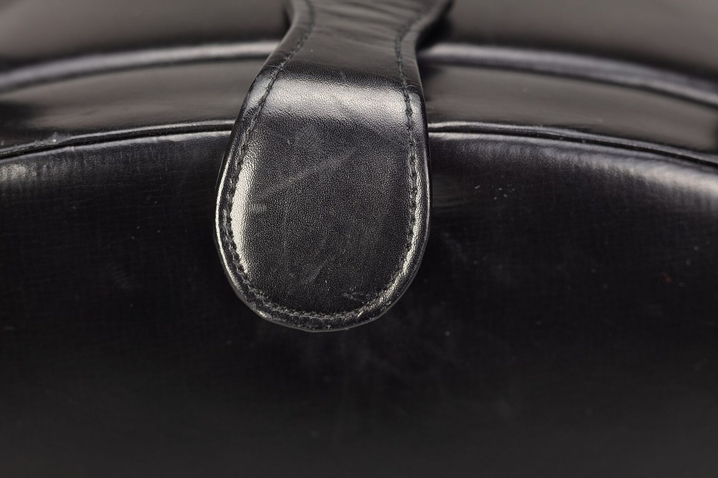 Black leather oval handbag