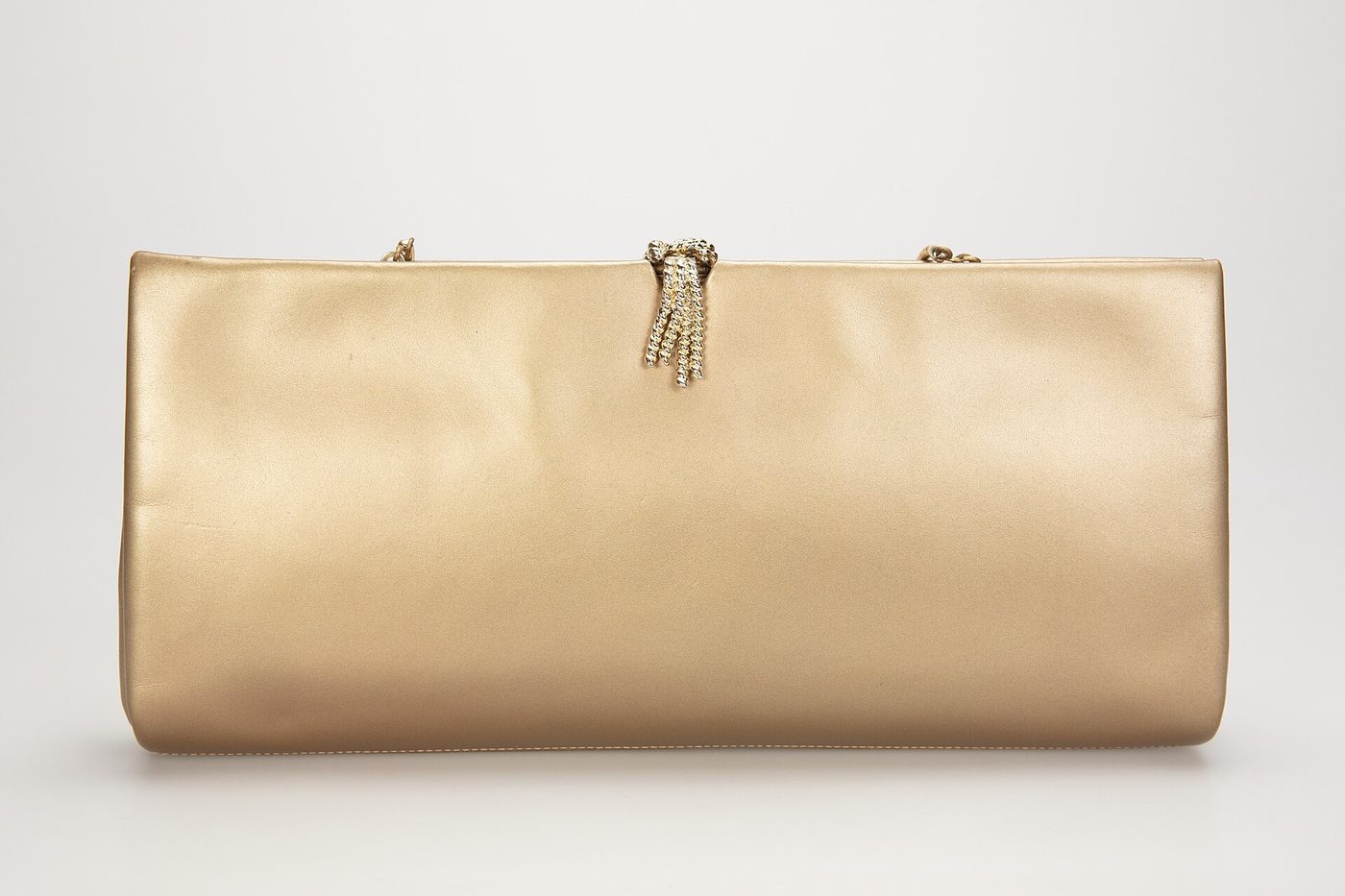Gold leather clutch purse with hidden chain handle