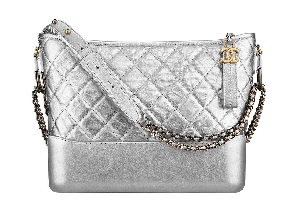 Chanel Gabrielle hobo bag in aged calfskin with dual-tone chains