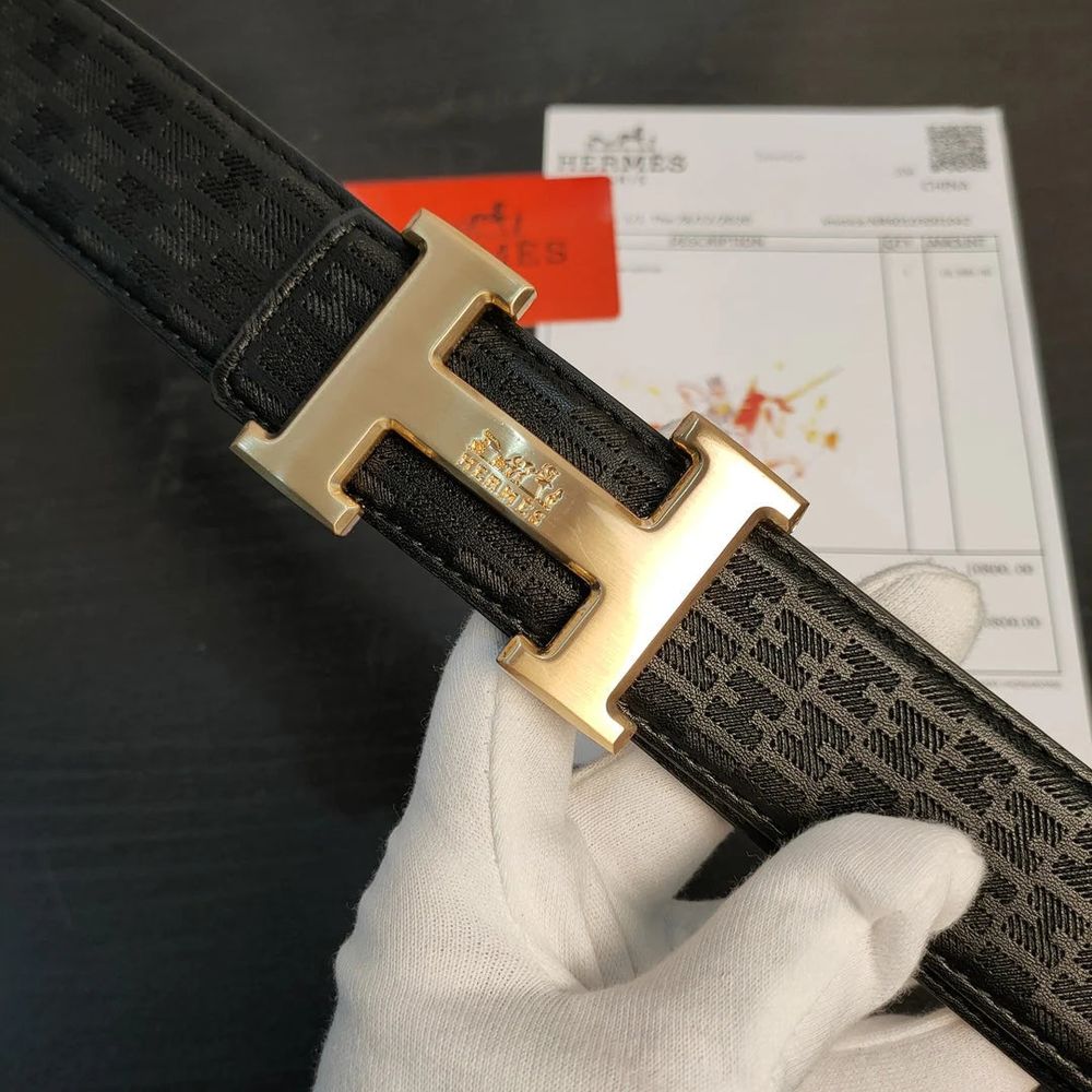 Hermès H belt buckle in brushed metal with leather strap