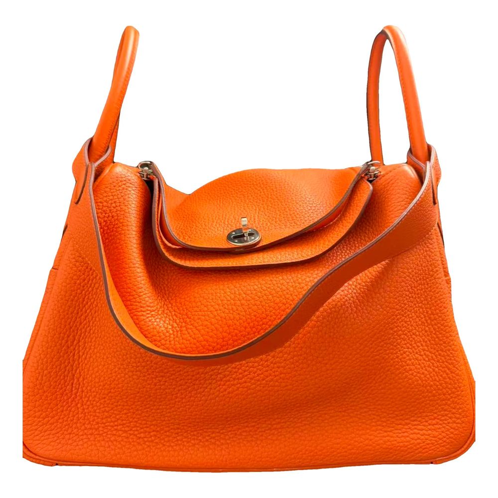 Hermès Lindy bag with its distinctive folded silhouette and shoulder strap