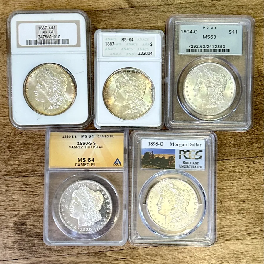 Graded coins in certified holders — PCGS, NGC and other grading-service slabs bought for cash in Boston