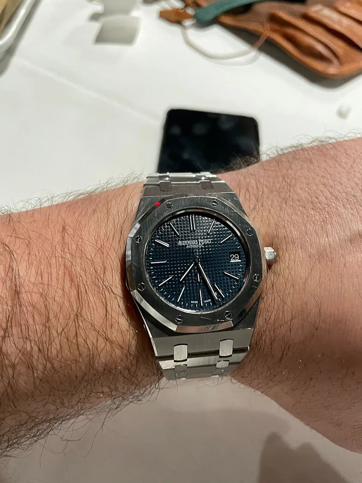 Audemars Piguet Royal Oak with blue tapisserie dial on the wrist — we buy Audemars Piguet watches in Boston