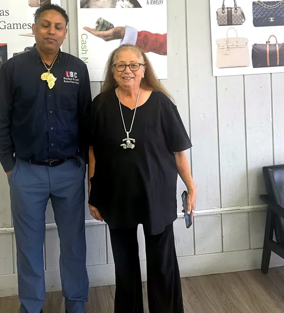 Teresa King with Danny at the LBC Pawn counter — Teresa has been part of the LBC team for 20 years