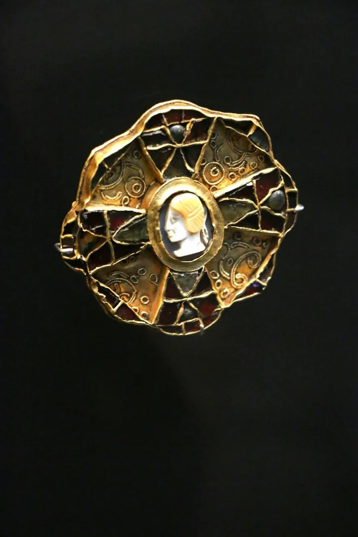 Gold cameo brooch — estate jewelry bought at LBC Pawn Boston