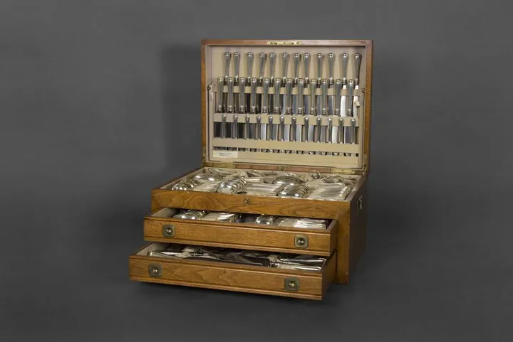 Sterling silver flatware set in its chest — silver buyer Boston, LBC Pawn