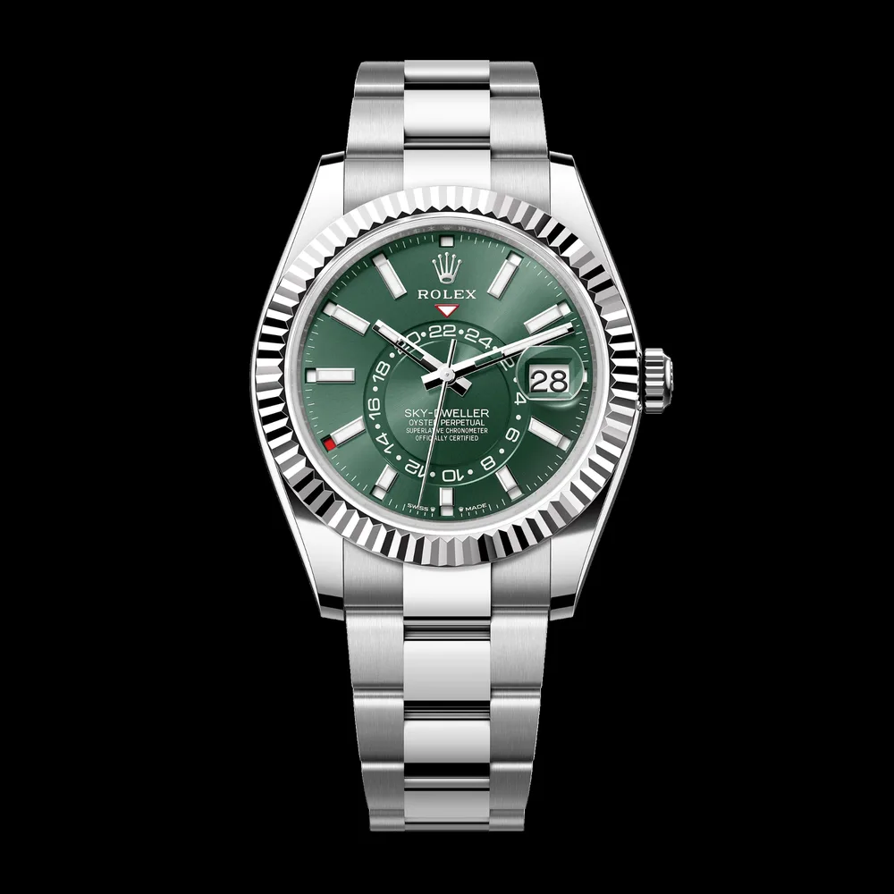 Rolex Sky-Dweller with mint green dial and fluted bezel — we buy Sky-Dwellers in Boston