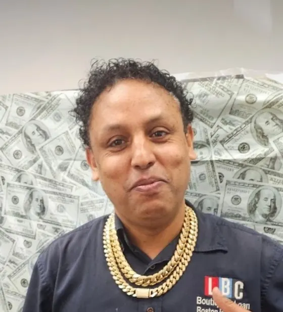Danny Berhe, shop manager at LBC Pawn in Boston